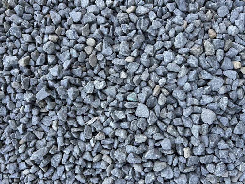 A delivered pile of decorative rock and gravel ready to spread